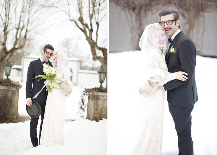 Winter bride and groom embrace during the first snow