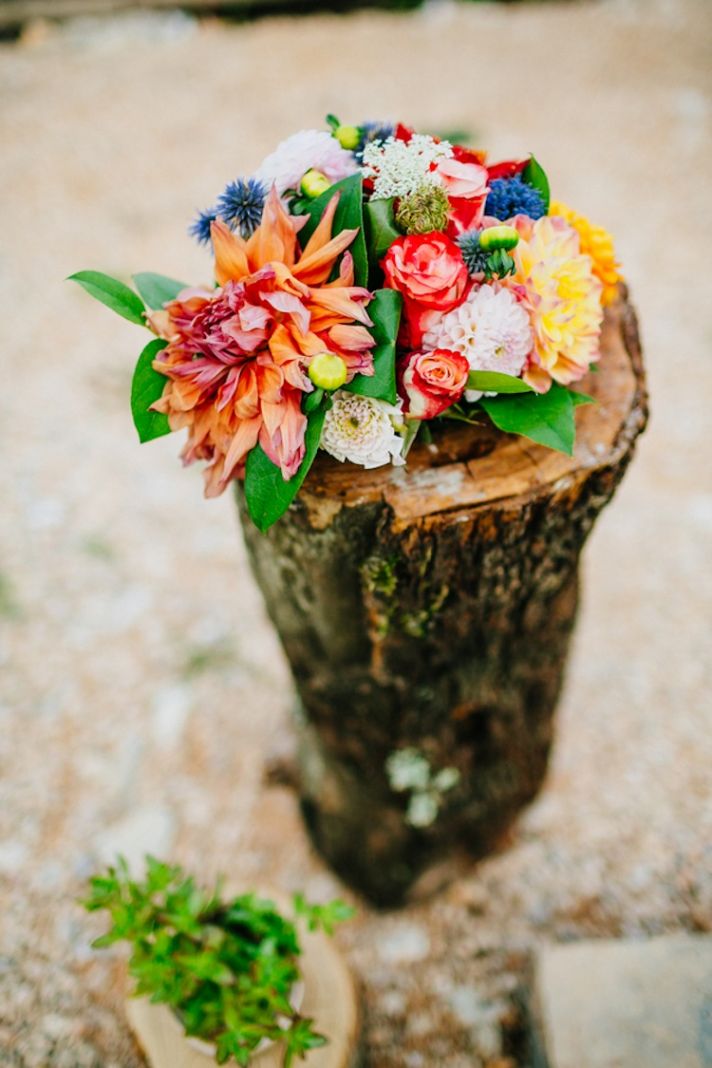 Ceremony aisle decor with bright blooms