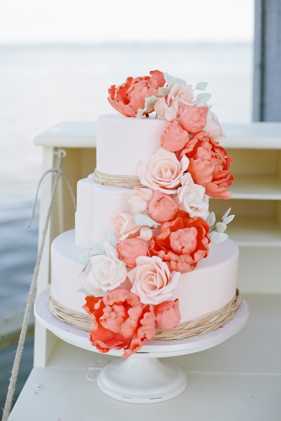 photo of Romantic 3 Tier Wedding Cake with Peach Coral Blooms
