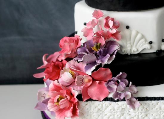 photo of 25 Delightful Wedding Cakes with Cascading Florals