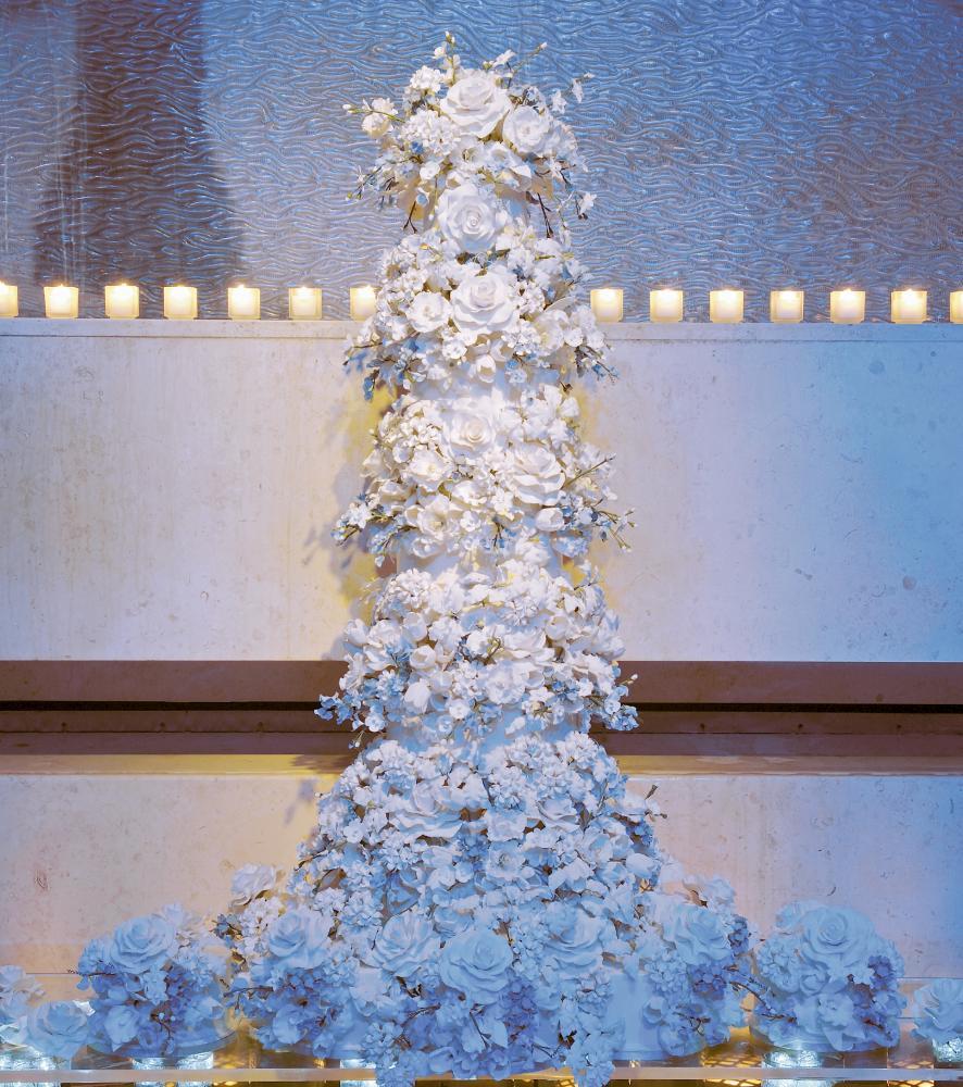 photo of 25 Delightful Wedding Cakes with Cascading Florals