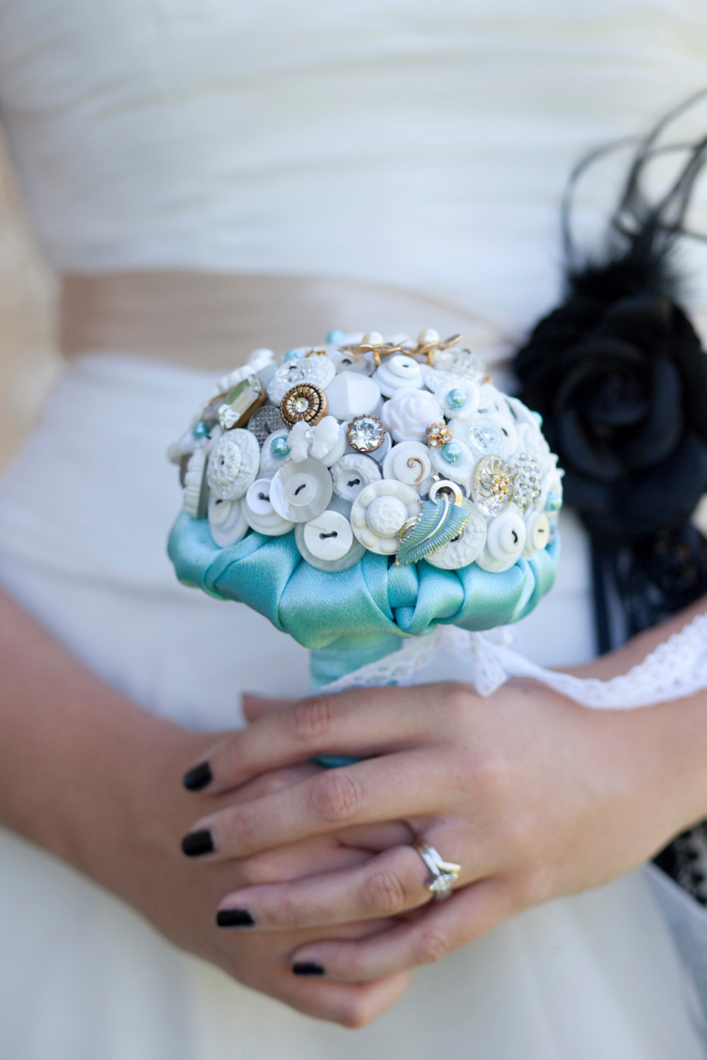 White-gold-and-aqua-button-wedding-bouquet.full
