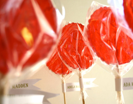 Red stamped wedding favor lollipops