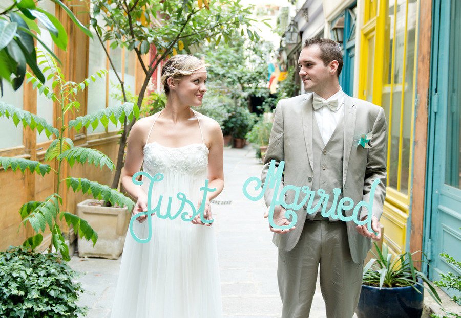 Pastel-turquoise-just-married-wedding-signs.full