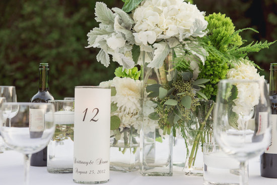 Luminaries table numbers for outdoor wedding