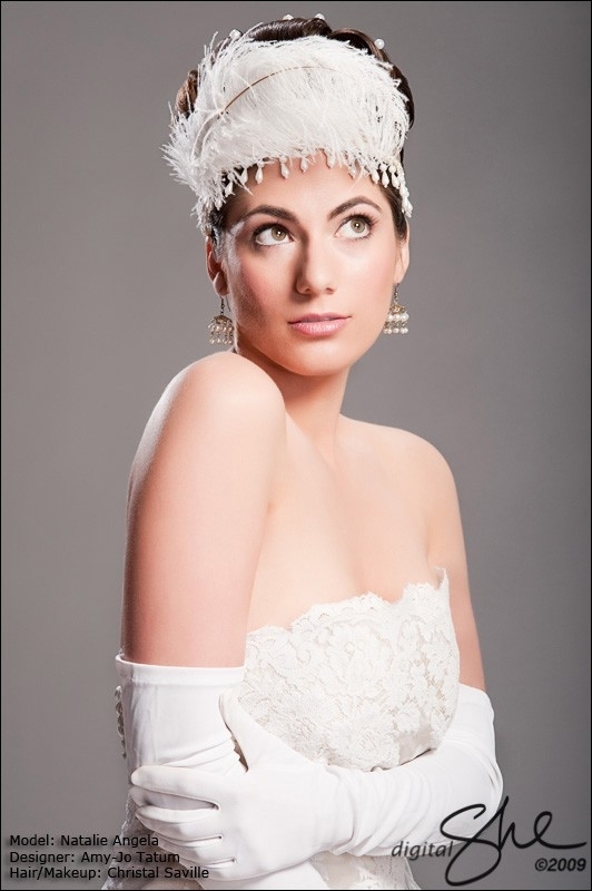 Wedding-fashion-style-hairstyles-white-feather-headpiece-pearls.full
