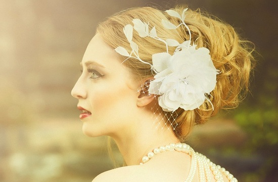 vintage inspired bridal headpiece with flower and feathers