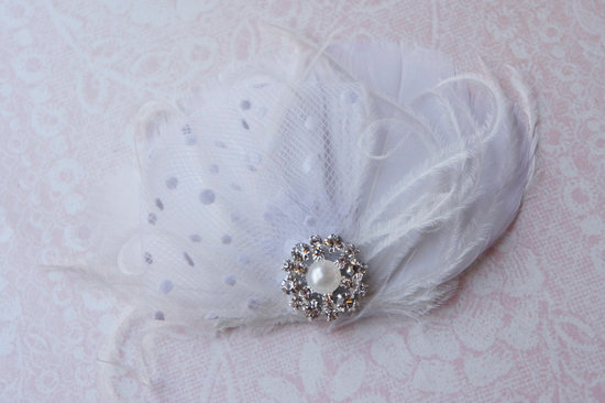 Dotted tulle and feather wedding fascinator