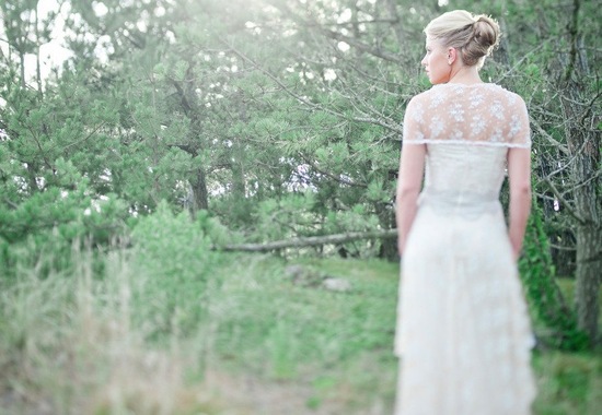 Sheer lace bridal bolero over Claire Pettibone wedding dress