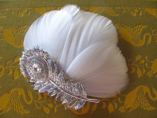 White peacock feather wedding fascinator