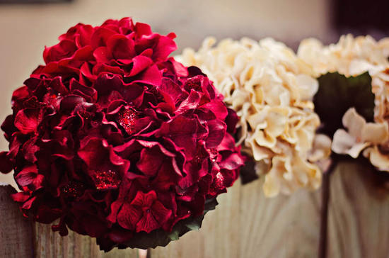 Deep red and ivory wedding flower arrangements