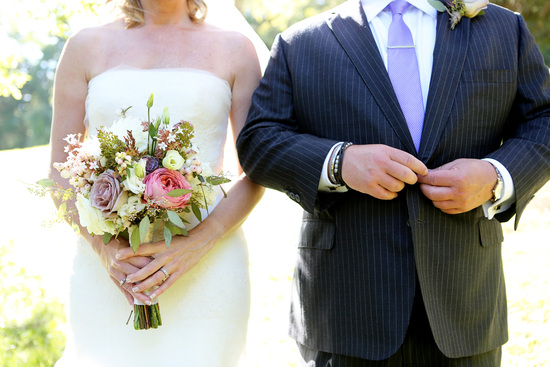 southern bride and groom pose together