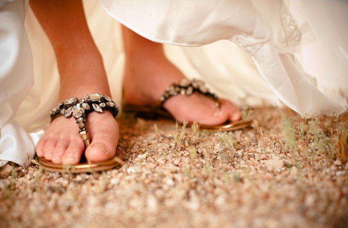 Desert-chic-wedding-bride-wears-bejeweled-sandals.full
