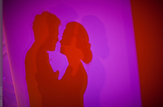 Romantic wedding photo with silhouettes of nearlywed couple
