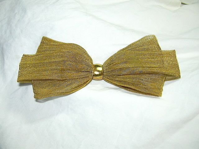 Metallic-gold-bow-tie-grooms-attire.full