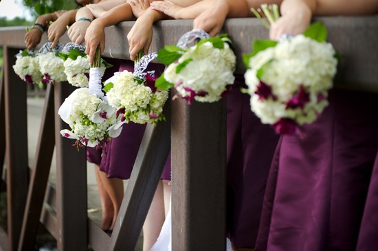 Outdoor real wedding-bridesmaids wear eggplant purple dresses