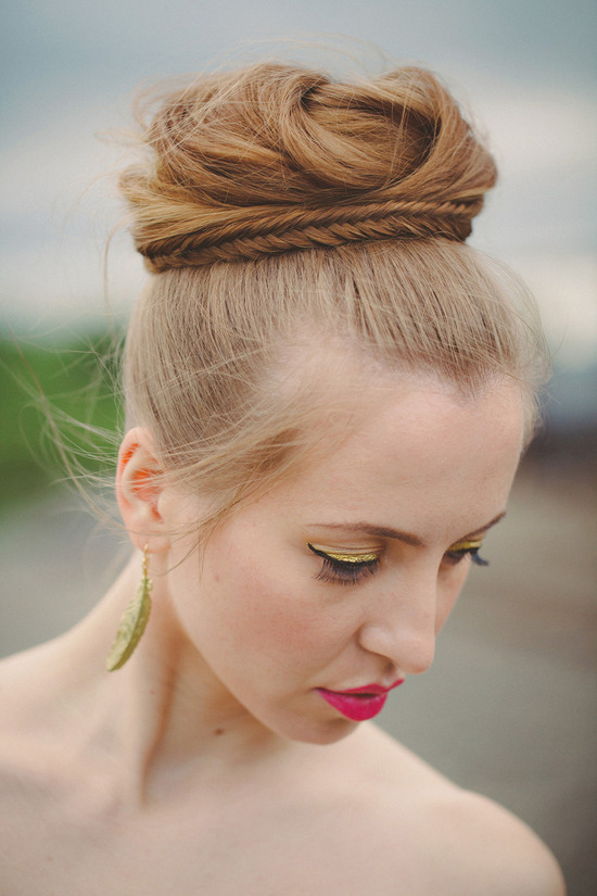 high bridal bun wrapped with fishtail braid