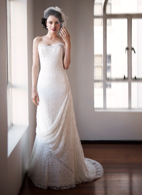 photo of beautiful crochet wedding gown with draping