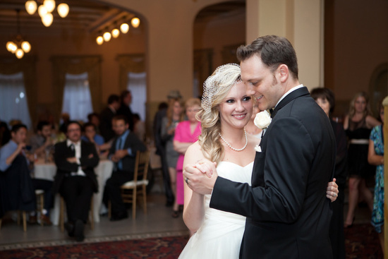 Bride and groom share an intimate kiss during the reception