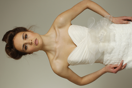 photo of Romantic ivory sweetheart neckline Fall 2011 wedding dress with bridal sash