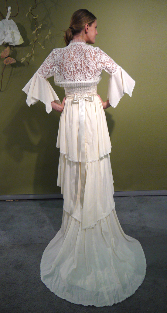 Romantic ivory column sweetheart wedding dress with sheer lace bolero and 3/4 sleeves by Claire Pett