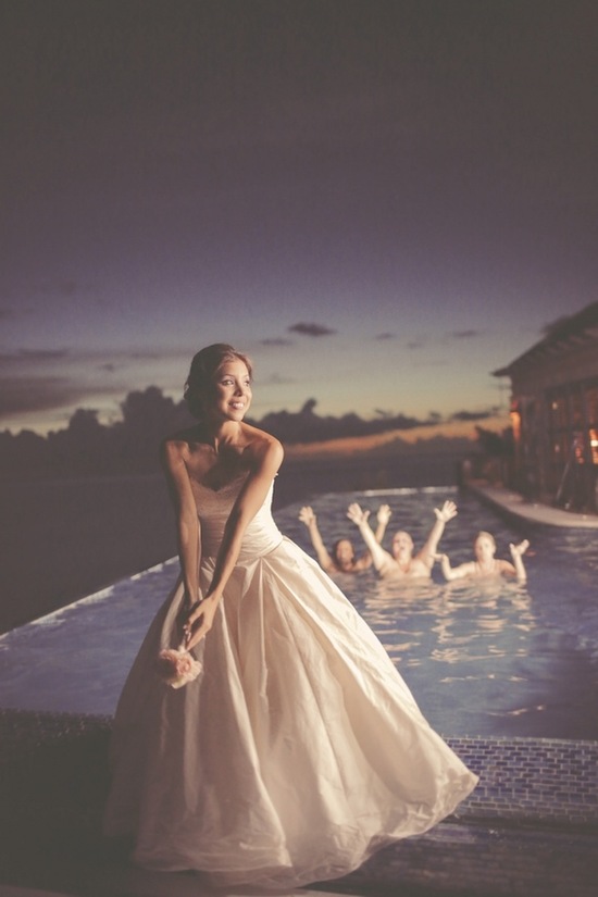 Bouquet toss to bridesmaids in the pool in St Lucia