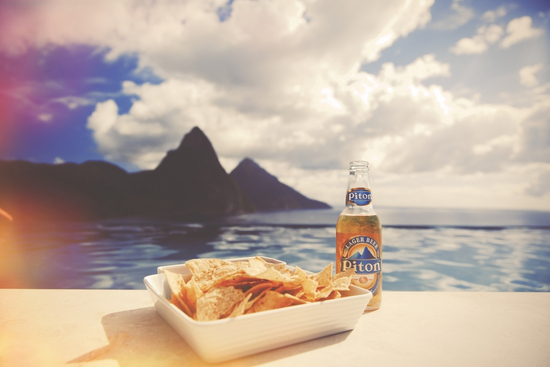 Chips and a Piton beer looking over the Pitons in St Lucia