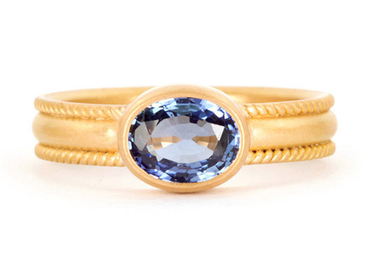 photo of Sapphire engagement ring with thick yellow gold band