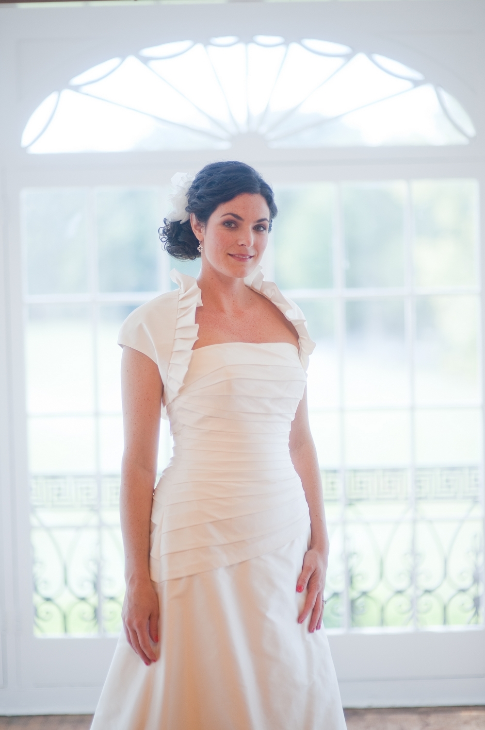 Wedding-hairstyles-updo-classic-curly-updo-with-flower-in-hair-ivory-strapless-wedding-dress.full