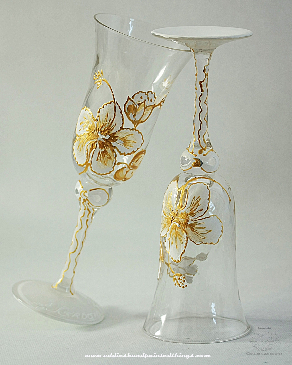 Handpainted-champagne-toasting-flutes-gold-white-floral-design.full