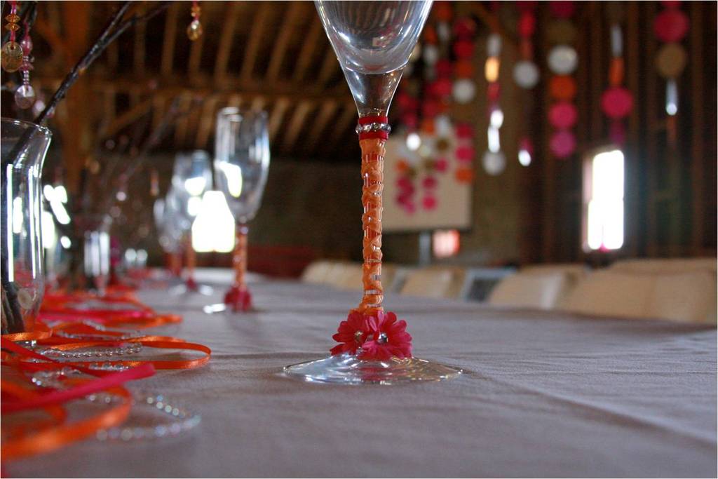 Wedding-detail-photo-hot-pink-orange-wedding-color-palette-wine-glasses-at-reception.full