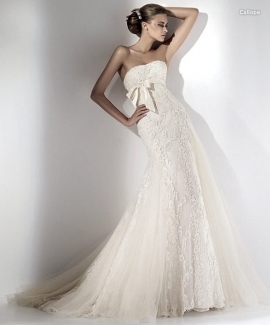 Is this bride in her Ellie Saab strapless white wedding dress doing a sniff check on her underarms?