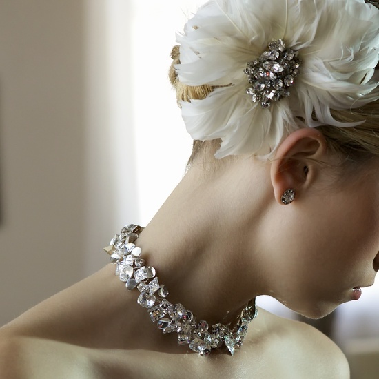 photo of Chunky bridal statement necklace and ivory feather flower hair accent
