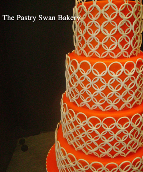 Bright-orange-5-tier-wedding-cake-ivory-classic-pattern.full