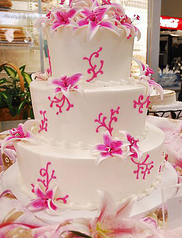photo of White and Pink Tropical Wedding Cake