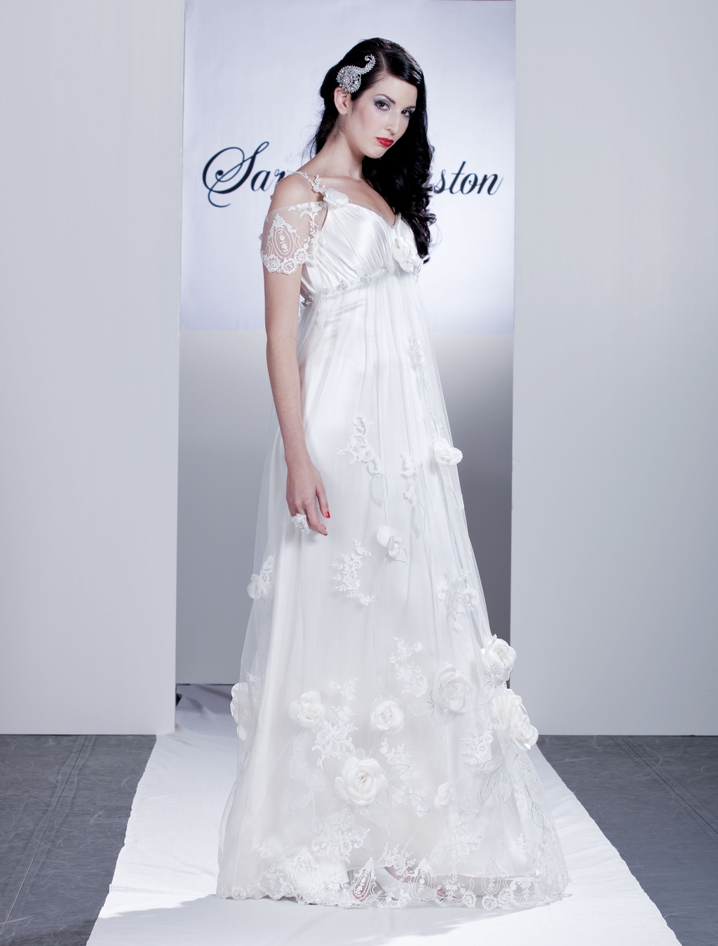 Wysteria-white-wedding-dress-large-floral-rosette-appliques-on-skirt-off-the-shoulder-sheer-lace-sleeves.full