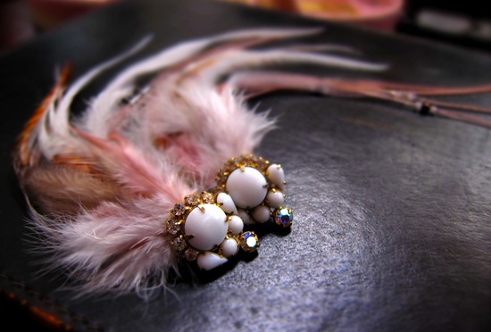 photo of Feather bridal fascinator with milk glass details