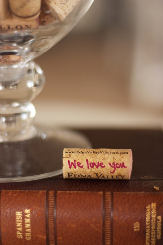 photo of unique wedding guest book ideas wine corks