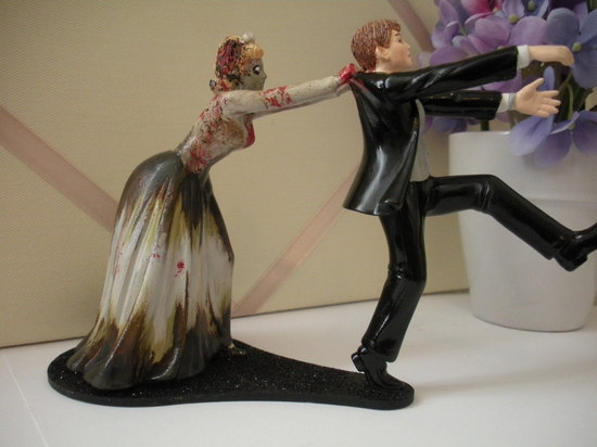photo of Zombie Chaser wedding cake topper