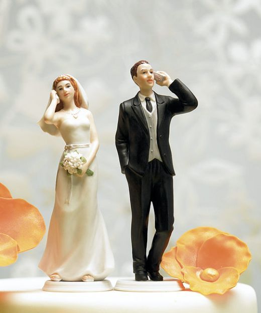 photo of get the prenup wedding cake topper