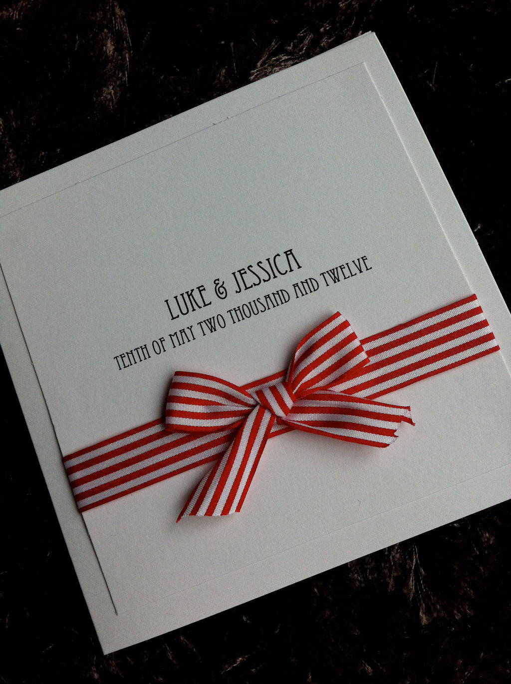 Red-white-stripe-bow-adorned-wedding-invitations.full