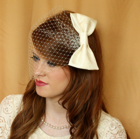 photo of Ivory satin birdcage veil with bow