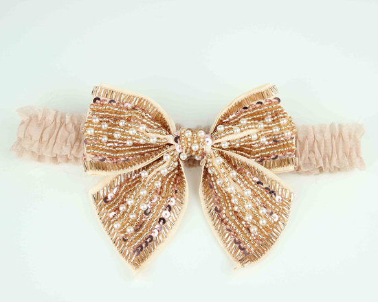 photo of Gold beaded bow bridal garter