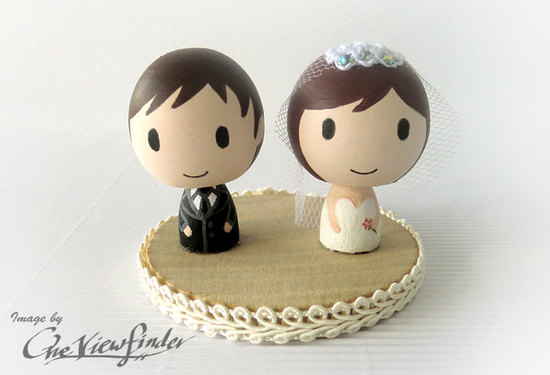 photo of Cute couple wedding cake topper