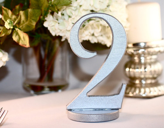 photo of Metallic silver wedding reception table numbers