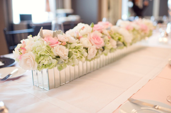 photo of spring wedding flowers soft pink green centerpiece