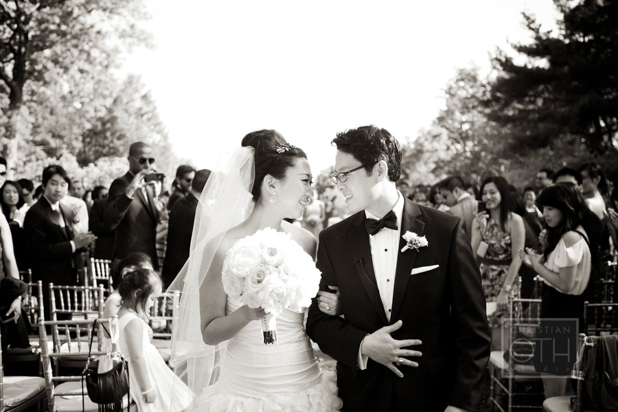 Bride-groom-look-lovingly-after-wedding-ceremony-vows.full