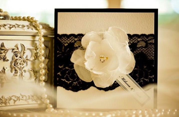 Elegant-wedding-invitations-with-black-lace-applique-and-floral-blooms.full