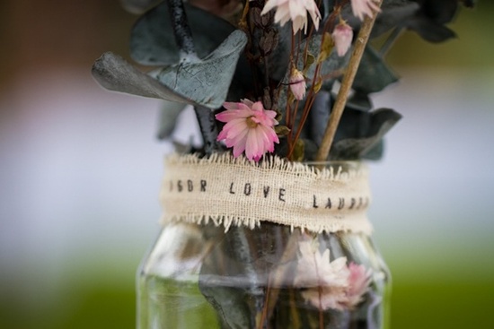 photo of romantic outdoor wedding spring wedding inspiration mason jar centerpieces
