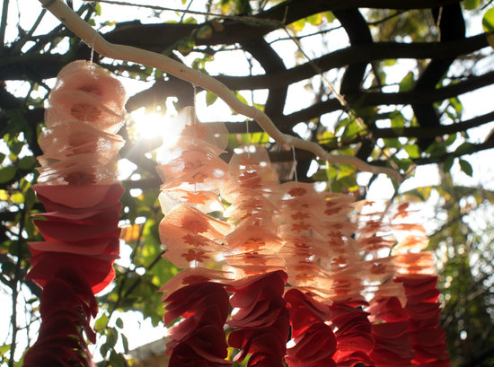 photo of Orange ombre outdoor wedding backdrop